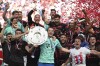 Bayern Munich players celebrate the German Bundesliga Championship with the trophy after the German Bundesliga soccer match between 1 FC Cologne and Bayern Munich in Cologne, Germany, Saturday, May 27, 2023 (Federico Gambarini/dpa via AP)