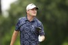 Emiliano Grillo, of Argentina, watches his tee shot on the third hole during the third round of the Charles Schwab Challenge golf tournament at Colonial Country Club in Fort Worth, Texas, Saturday, May 27, 2023. (AP Photo/LM Otero)