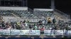 Fans watch from behind signs hanging in right field during the fifth inning of a baseball game between the Oakland Athletics and the Houston Astros in Oakland, Calif., Saturday, May 27, 2023. (AP Photo/Jeff Chiu)