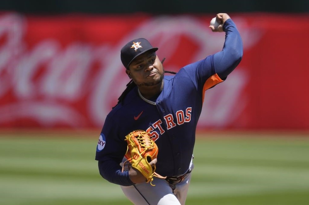 Houston Astros pitcher Framber Valdez works against the Oakland Athletics during the first inning of a baseball game in Oakland, Calif., Saturday, May 27, 2023. (AP Photo/Jeff Chiu)