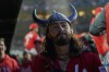 Cincinnati Reds Jonathan India wearings Viking-inspired props in the dugout after scoring his second two-run home run of a baseball game during the seventh inning against the Chicago Cubs, Saturday, May 27, 2023, in Chicago. (AP Photo/Erin Hooley)