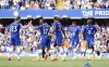 Chelsea celebrate an own goal by Newcastle United's Kieran Trippier, during the English Premier League soccer match between Chelsea and Newcastle United, at Stamford Bridge, London, Sunday May 28, 2023. (Zac Goodwin/PA via AP)