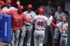 St. Louis Cardinals' Paul Goldschmidt (46) is congratulated in the dugout after hitting a solo home run off Cleveland Guardians starting pitcher Hunter Gaddis during the fifth inning of a baseball game, Sunday, May 28, 2023, in Cleveland. (AP Photo/David Dermer)