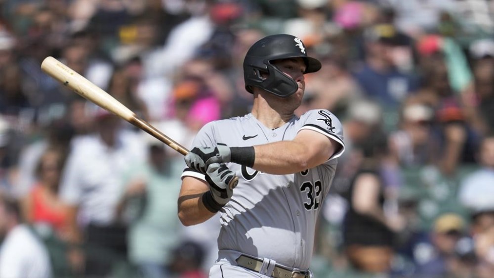 Chicago White Sox's Gavin Sheets hits a single against the Detroit Tigers in the seventh inning of a baseball game, Sunday, May 28, 2023, in Detroit. (AP Photo/Paul Sancya)