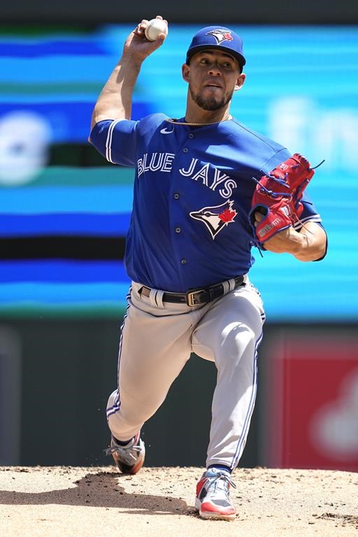 Toronto Blue Jays starting pitcher Jose Berrios delivers during the first inning of a baseball game against the Minnesota Twins, Sunday, May 28, 2023, in Minneapolis. (AP Photo/Abbie Parr)