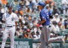 Texas Rangers' Corey Seager (5) rounds the bases past Detroit Tigers third baseman Zack Short after hitting a three-run home run during the fifth inning of a baseball game Monday, May 29, 2023, in Detroit. (AP Photo/Duane Burleson)