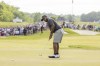 Harold Varner, III of RangeGoats GC, makes his final putt on the 18th green during the final round of LIV Golf DC at Trump National, Sunday, May 28, 2023, in Sterling, Va. (Hunter Martin/LIV Golf via AP)