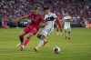 St. Louis City's Lucas Bartlett (24) and Vancouver Whitecaps' Alessandro Schopf (8) battle for the ball during the first half of an MLS soccer match Saturday, May 27, 2023, in St. Louis. The Whitecaps have not won away from B.C. Place in Major League Soccer regular season play this year and have taken 14 of their 17 points at home. THE CANADIAN PRESS/AP-Jeff Roberson