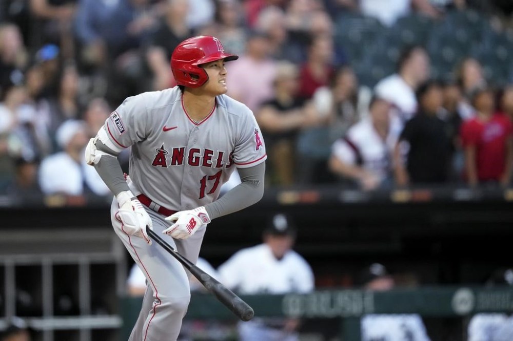 Los Angeles Angels' Shohei Ohtani watches his flyout during the first inning of the team's baseball game against the Chicago White Sox on Tuesday, May 30, 2023, in Chicago. (AP Photo/Charles Rex Arbogast)