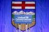 The head of an LGBTQ group in central Alberta says he wasn't surprised a candidate who compared transgender students in schools to feces in food won her seat in Monday's provincial election, which saw the United Conservative Party win a majority government. A UCP sign is shown in front of the Alberta flag prior to the party's leadership announcement in Calgary, Alta., Thursday, Oct. 6, 2022.THE CANADIAN PRESS/Jeff McIntosh