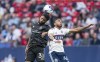Vancouver Whitecaps FC's Pedro Vite, right, battles with Houston Dynamo FC's Micael battle for the ball during first half MLS soccer action in Vancouver, B.C., Wednesday, May 31, 2023. THE CANADIAN PRESS/Rich Lam