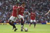 Manchester United's Marcus Rashford, left, and Manchester United's Jadon Sancho during the English Premier League soccer match between Manchester United and Fulham at Old Trafford in Manchester, England, Sunday, May 28, 2023. (AP Photo/Rui Vieira)