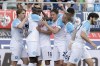Napoli's Victor Osimhen, 2nd left, celebrates with teammates after scoring during the Serie A soccer match between Bologna and Napoli at the Bologna Renato Dall'Ara stadium, Italy, Sunday, May 28, 2023. (Michele Nucci/LaPresse via AP)