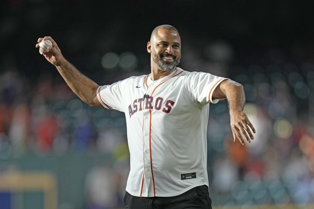 Houston Rockets coach Ime Udoka throws out a ceremonial first pitch before a baseball game between the Los Angeles Angels and Houston Astros Thursday, June 1, 2023, in Houston. (AP Photo/David J. Phillip)