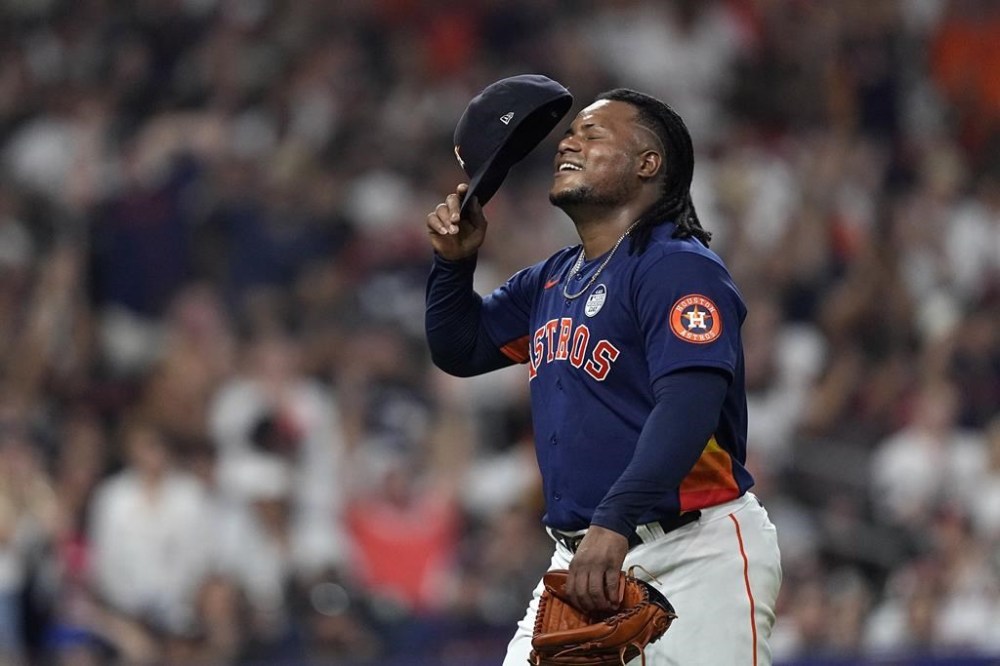 Houston Astros starting pitcher Framber Valdez reacts after the Astros turned a double play to during the seventh inning of a baseball game against the Los Angeles Angels Friday, June 2, 2023, in Houston. (AP Photo/David J. Phillip)