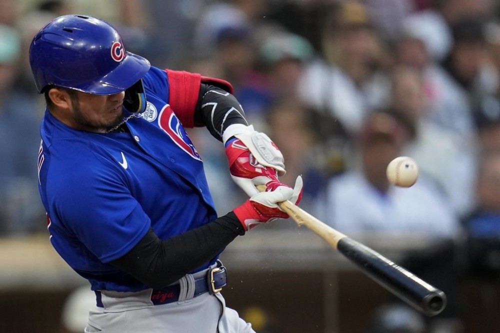 Chicago Cubs' Seiya Suzuki breaks his bat as he pops out during the third inning of a baseball game against the San Diego Padres, Friday, June 2, 2023, in San Diego. (AP Photo/Gregory Bull)