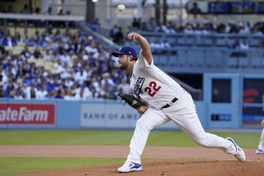 Los Angeles Dodgers starting pitcher Clayton Kershaw throws to the plate during the first inning of a baseball game against the New York Yankees Friday, June 2, 2023, in Los Angeles. (AP Photo/Mark J. Terrill)