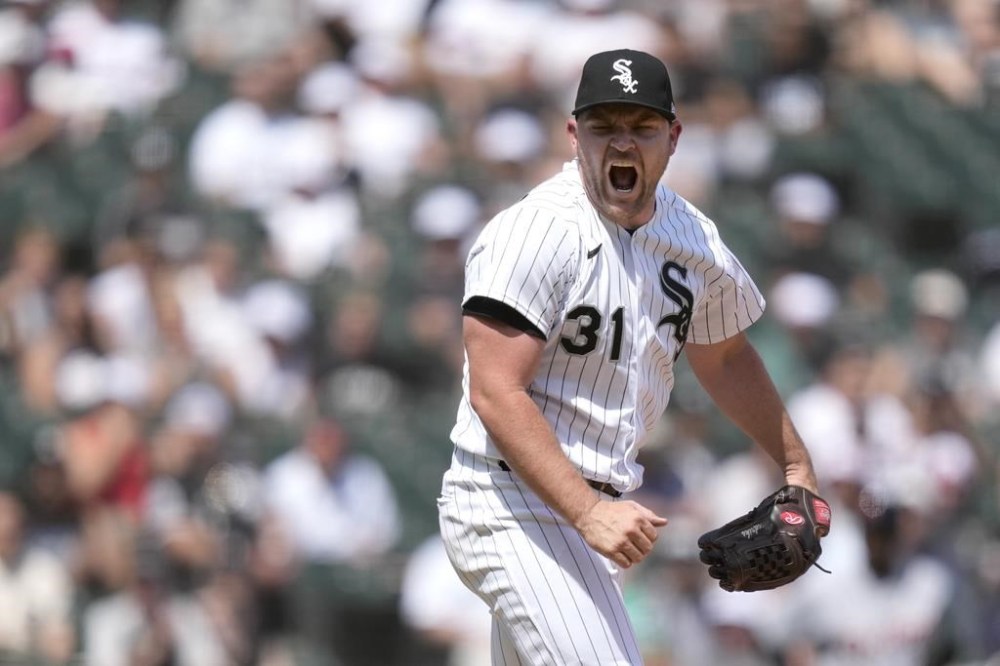 Chicago White Sox relief pitcher Liam Hendriks reacts after striking out Detroit Tigers' Zack Short to end the top half of the seventh inning in a baseball game Saturday, June 3, 2023, in Chicago. (AP Photo/Charles Rex Arbogast)