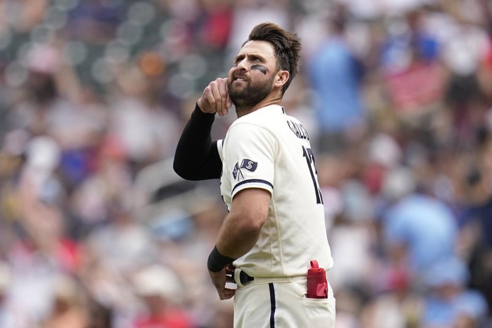 Minnesota Twins first baseman Joey Gallo reacts while walking to first base after striking out to end the bottom of the seventh inning of a baseball game against the Toronto Blue Jays, Sunday, May 28, 2023, in Minneapolis. (AP Photo/Abbie Parr)