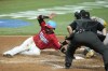Miami Marlins' Luis Arraez scores on a sacrifice fly by Bryan De La Cruz during the second inning of a baseball game against the Oakland Athletics, Saturday, June 3, 2023, in Miami. (AP Photo/Lynne Sladky)