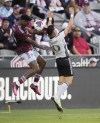 Colorado Rapids defender Moïse Bombito, left, and San Jose Earthquakes forward Cristian Espinoza vie for control of the ball in the first half of an MLS soccer match Saturday, June 3, 2023, in Commerce City, Colo. (AP Photo/David Zalubowski)