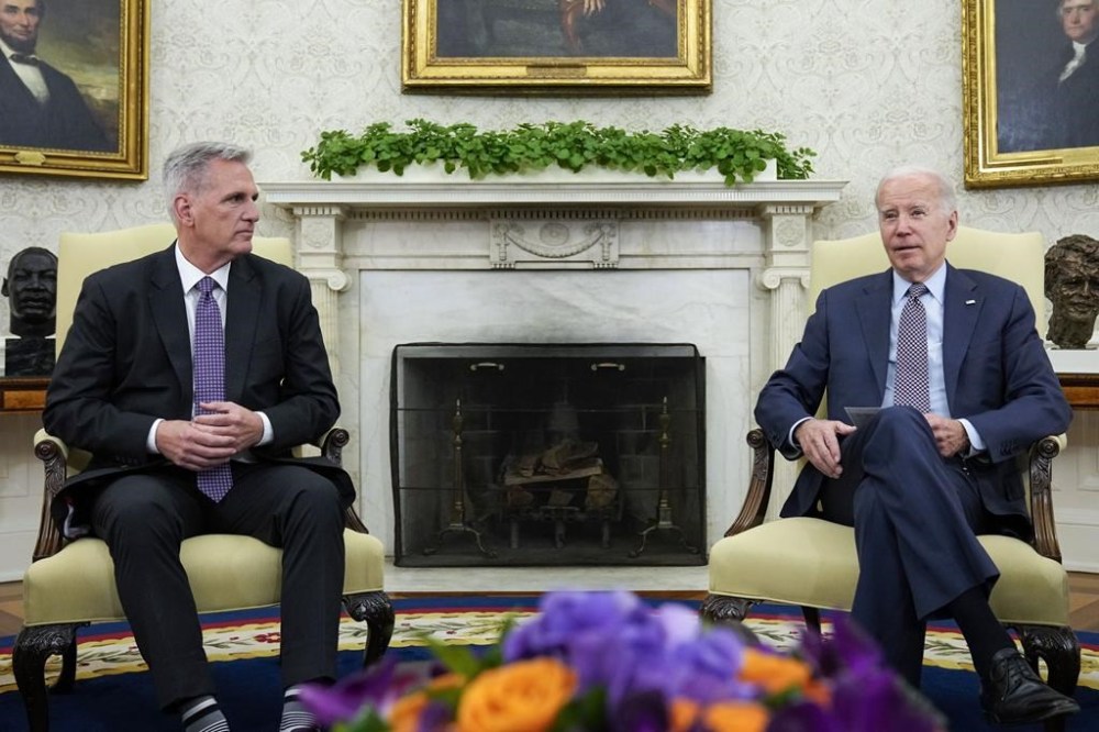 FILE - President Joe Biden meets with House Speaker Kevin McCarthy of Calif., to discuss the debt limit in the Oval Office of the White House, May 22, 2023, in Washington. Biden kept his eye on the long game when negotiating a deal with House Republicans to avert a U.S. government default. The bipartisan agreement is emblematic of his approach to deal-making as he looks to prime himself for a reelection campaign.(AP Photo/Alex Brandon, File)