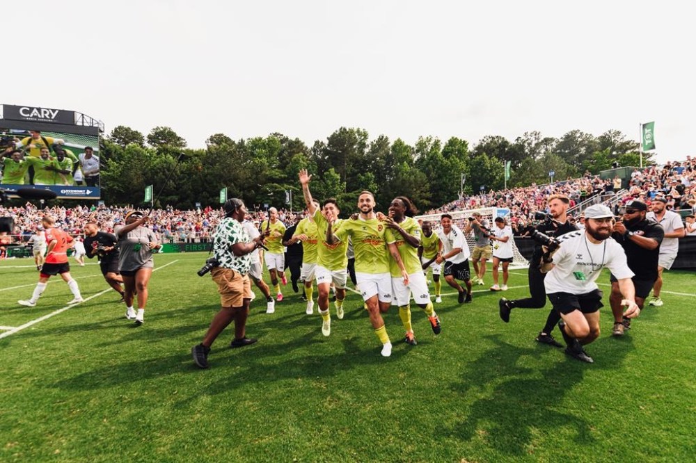 Players from Newtown Pride FC celebrate on Sunday June 4, 2023 after defeating Canada's SLC FC 2-0 in the final of The Soccer Tournament in Cary, North Carolina, a seven-versus-seven soccer tournament with a winner take-all-prize of US$1 million. THE CANADIAN PRESS/HO-Creative X TST
**MANDATORY CREDIT **