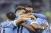 Uruguay's players celebrate their side's opening goal against United States scored by teammate Anderson Duarte, second from left, during a FIFA U-20 World Cup quarterfinal soccer match at the Madre de Ciudades stadium in Santiago del Estero, Argentina, Sunday, June 4, 2023. (AP Photo/Nicolas Aguilera)