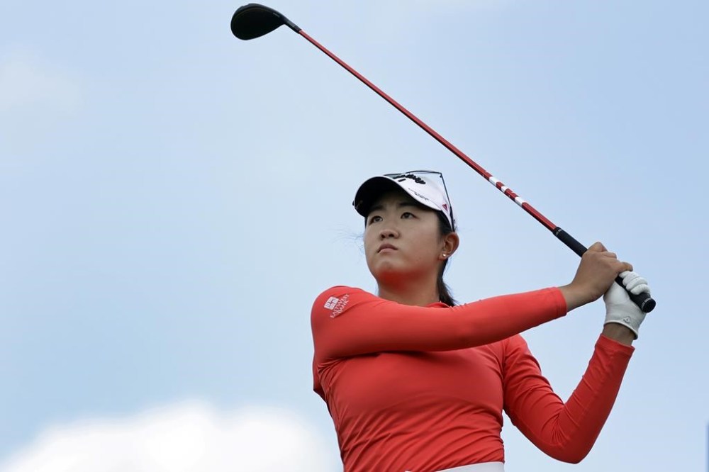 CORRECTS TO FINAL ROUND NOT FIRST ROUND - Rose Zhang tees off on the fifth hole during the final round of the Mizuho Americas Open golf tournament, Sunday, June 4, 2023, in Jersey City, N.J. (AP Photo/Adam Hunger)