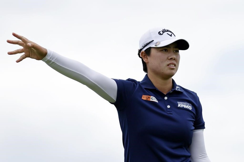 Yuka Saso, of Japan, reacts to her third hole tee shot during the final round of the Mizuho Americas Open golf tournament, Sunday, June 4, 2023, in Jersey City, N.J. (AP Photo/Adam Hunger)