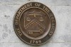FILE - The Department of the Treasury's seal outside the Treasury Department building in Washington on May 4, 2021. The U.S. sanctioned a group of Russian-intelligence linked individuals Monday for their role in allegedly helping the Kremlin destabilize Moldova's democratically-elected government through protests in Moldova's capitol earlier this year. (AP Photo/Patrick Semansky, File)
