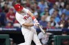 Philadelphia Phillies' J.T. Realmuto hits a two-run double against Detroit Tigers pitcher Mason Englert during the seventh inning of a baseball game, Monday, June 5, 2023, in Philadelphia. (AP Photo/Matt Slocum)