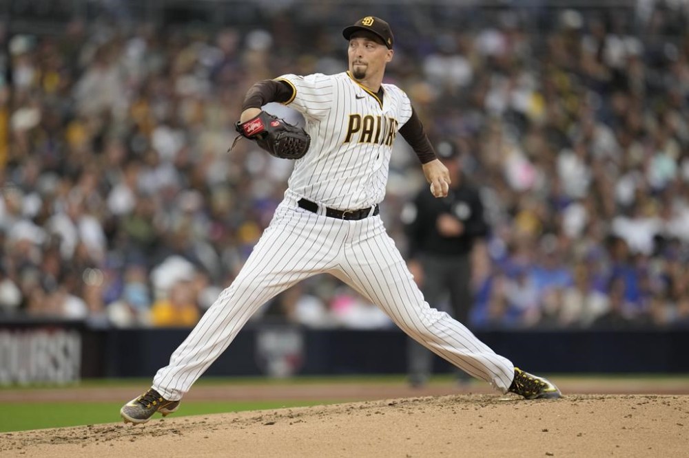 San Diego Padres starting pitcher Blake Snell works against a Chicago Cubs batter during the second inning of a baseball game Monday, June 5, 2023, in San Diego. (AP Photo/Gregory Bull)