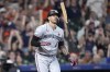 Minnesota Twins' Carlos Correa flips his bat after striking out during the ninth inning of a baseball game against the Houston Astros Monday, May 29, 2023, in Houston. (AP Photo/David J. Phillip)