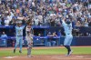 Toronto Blue Jays right fielder George Springer (4) celebrates his home run against the Houston Astros in third inning American League MLB baseball action in Toronto on Tuesday, June 6, 2023. THE CANADIAN PRESS/Andrew Lahodynskyj
