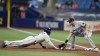 Tampa Bay Rays' Wander Franco dives back safely to first on a pickoff throw to Minnesota Twins' Alex Kirilloff (19) during the first inning of a baseball game Tuesday, June 6, 2023, in St. Petersburg, Fla. (AP Photo/Chris O'Meara)