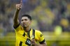 FILE - Dortmund's Jude Bellingham celebrates after scoring during the German Bundesliga soccer match between Borussia Dortmund and Eintracht Frankfurt in Dortmund, Germany, Saturday, April 22, 2023. Real Madrid and Borussia Dortmund have reached an agreement for the transfer of Jude Bellingham for a fee that could reach more than 130 million euros ($139 million), the German club said Wednesday, June 7, 2023. (AP Photo/Martin Meissner, File)