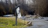 A realtor's sign on the lawn of a property destroyed by a wildfire is seen in Hammond's Plains, N.S., during a media tour, Tuesday, June 6, 2023. THE CANADIAN PRESS/POOL, Tim Krochak