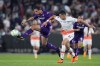 West Ham's Nayef Aguerd vies for the ball with Fiorentina's Giacomo Bonaventura, left, during the Europa Conference League final soccer match between Fiorentina and West Ham at the Eden Arena in Prague, Wednesday, June 7, 2023. (AP Photo/Petr David Josek)
