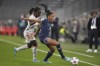 PSG's Ashley Lawrence, right, and Bayern's Viviane Assey fight for the ball during the women's quarterfinal Champions League first leg soccer match between Bayern Munich and Paris Saint-Germain in Munich, Germany, Tuesday, March 22, 2022. Canadian international Ashley Lawrence has confirmed she is leaving Paris Saint-Germain.THE CANADIAN PRESS/AP, Matthias Schrader
