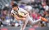 San Francisco Giants starting pitcher Logan Webb works against the Colorado Rockies during the first inning of a baseball game Wednesday, June 7, 2023, in Denver. (AP Photo/David Zalubowski)