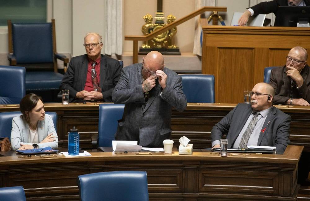 JESSICA LEE / WINNIPEG FREE PRESS
                                Dawson Trail MLA Bob Lagassé wipes his eyes during question period.