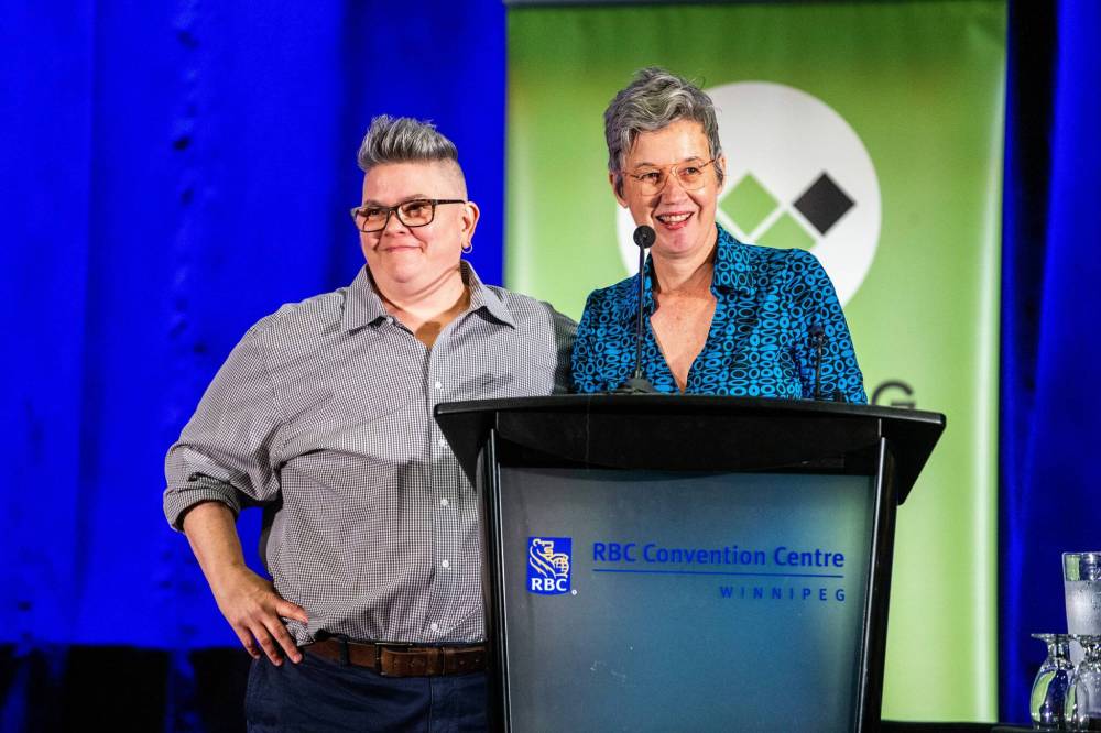 MIKAELA MACKENZIE / WINNIPEG FREE PRESS 
Career Achievement in the Arts winners Lorri Millan (left) and Shawna Dempsey accept their award at the Mayor's Luncheon for the Arts at the RBC Convention Centre on Thursday.