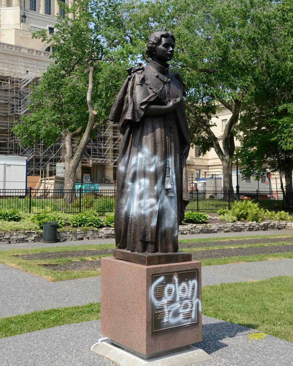 The Queen Elizabeth II statue on the grounds of the Manitoba Legislative Building was spray-painted shortly after it was returned to its place June 2. (George Penner photo)