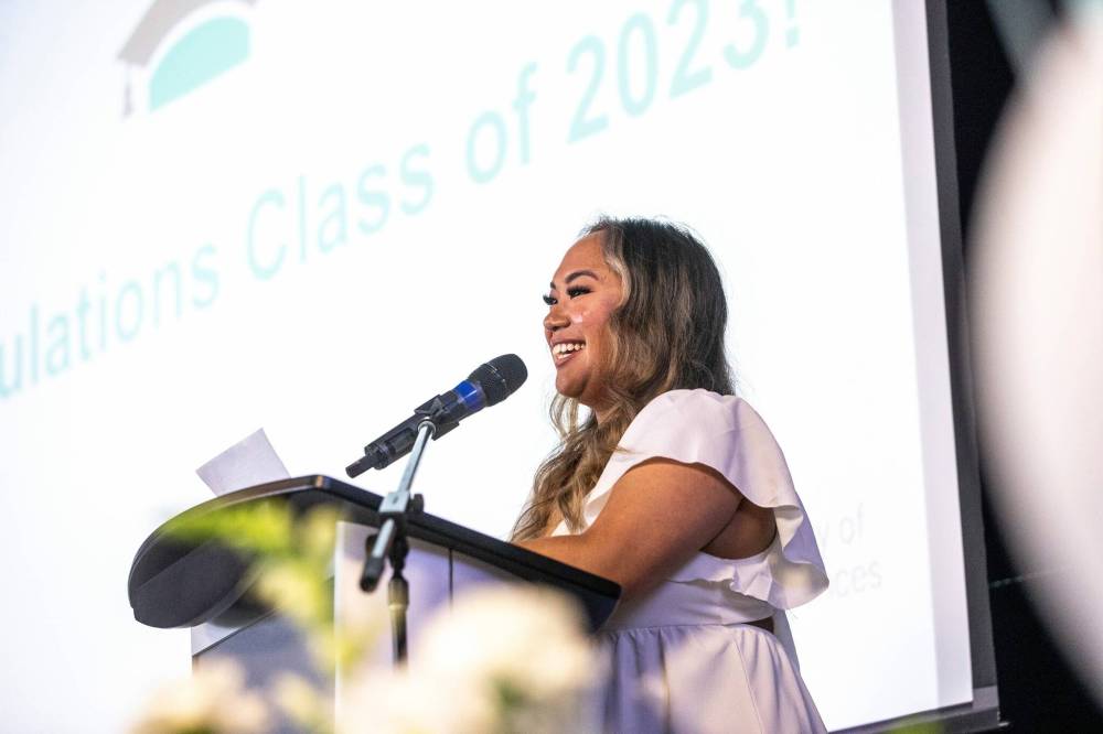 MIKAELA MACKENZIE / WINNIPEG FREE PRESS
Valedictorian Lynette Trinidad speaks at the College of Nursing graduating class of 2023 pinning ceremony at the IG Field Pinnacle Club on Wednesday.
