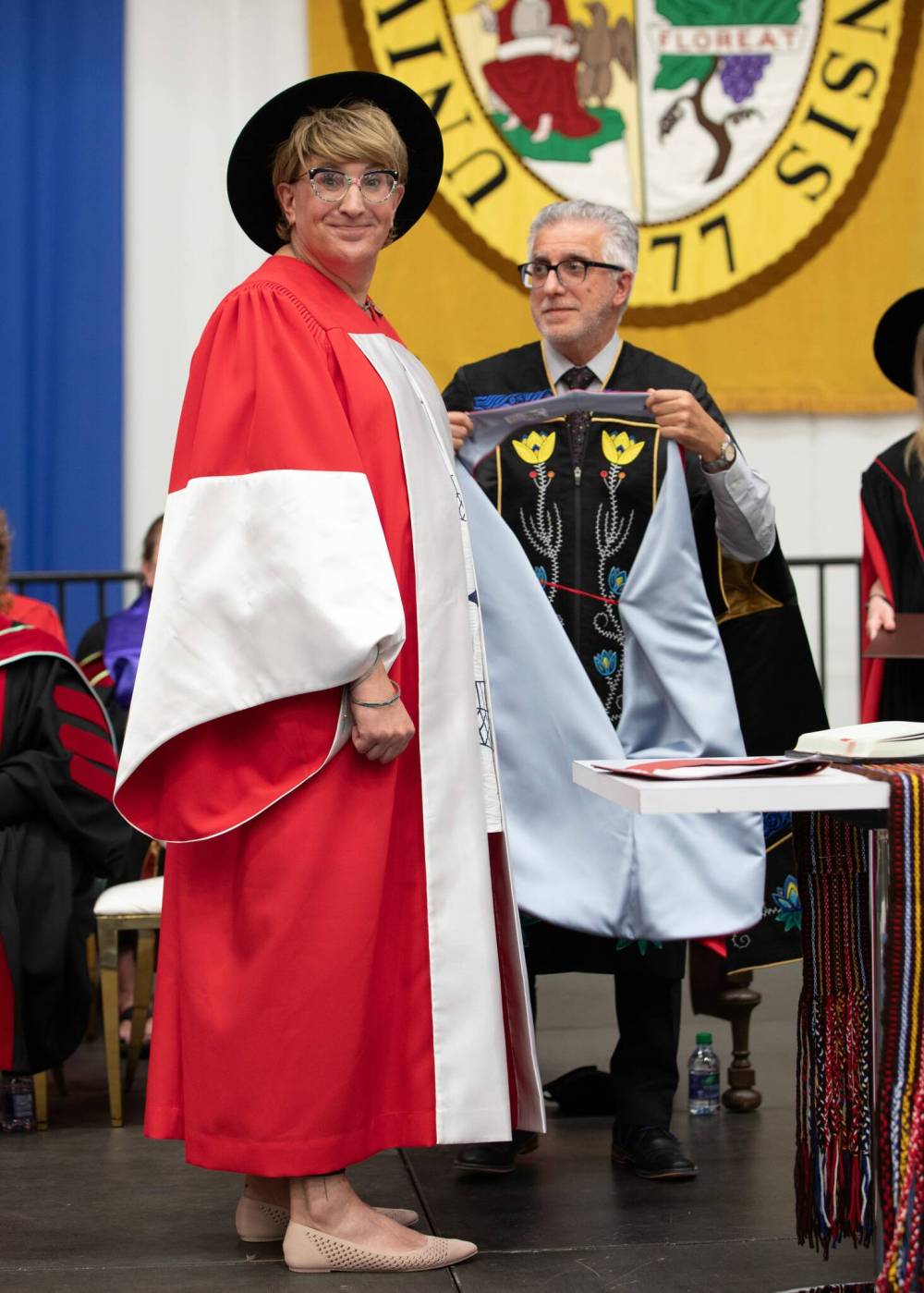 MIKE LATSCHISLAW / UNIVERSITY OF MANITOBA
Lara Rae receives an honorary degree from President and Vice-Chancellor Michael Benarroch at the University of Manitoba Wednesday.