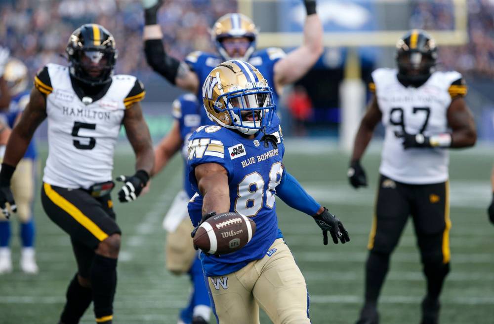 John Woods / THE CANADIAN PRESS
Rasheed Bailey scores a touchdown Friday against the Hamilton Tiger-Cats.