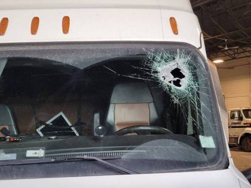 SUPPLIEDManitoba truck driver Eddie Friesen&rsquo;s windshield was hit by a flying chunk of concrete while headed south on Highway 75 near Emerson.