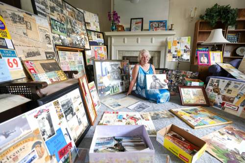 RUTH BONNEVILLE / WINNIPEG FREE PRESS
                                Children&rsquo;s Hospital Book Market volunteer Heather Emberley sits among the thousands of items she has found inside donated books over the years.