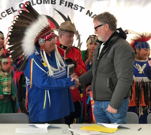 MARTIN CASH / WINNIPEG FREE PRESS
                                Christopher Colomb (left) chief of Marcel Colomb First Nation and John McCluskey CEO of Alamos Gold after signing an impact benefit agreement for the community to participate in the $500 million development of open pit gold mines near the reserve outside Lynn Lake, Man.
